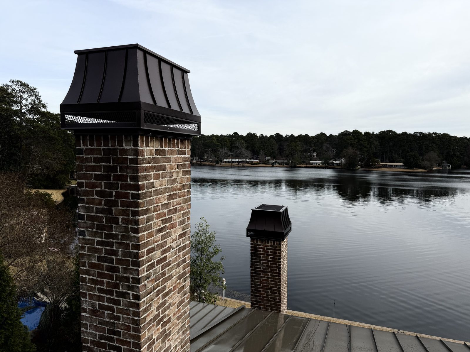 Custom chase shroud on a lakeside chimney