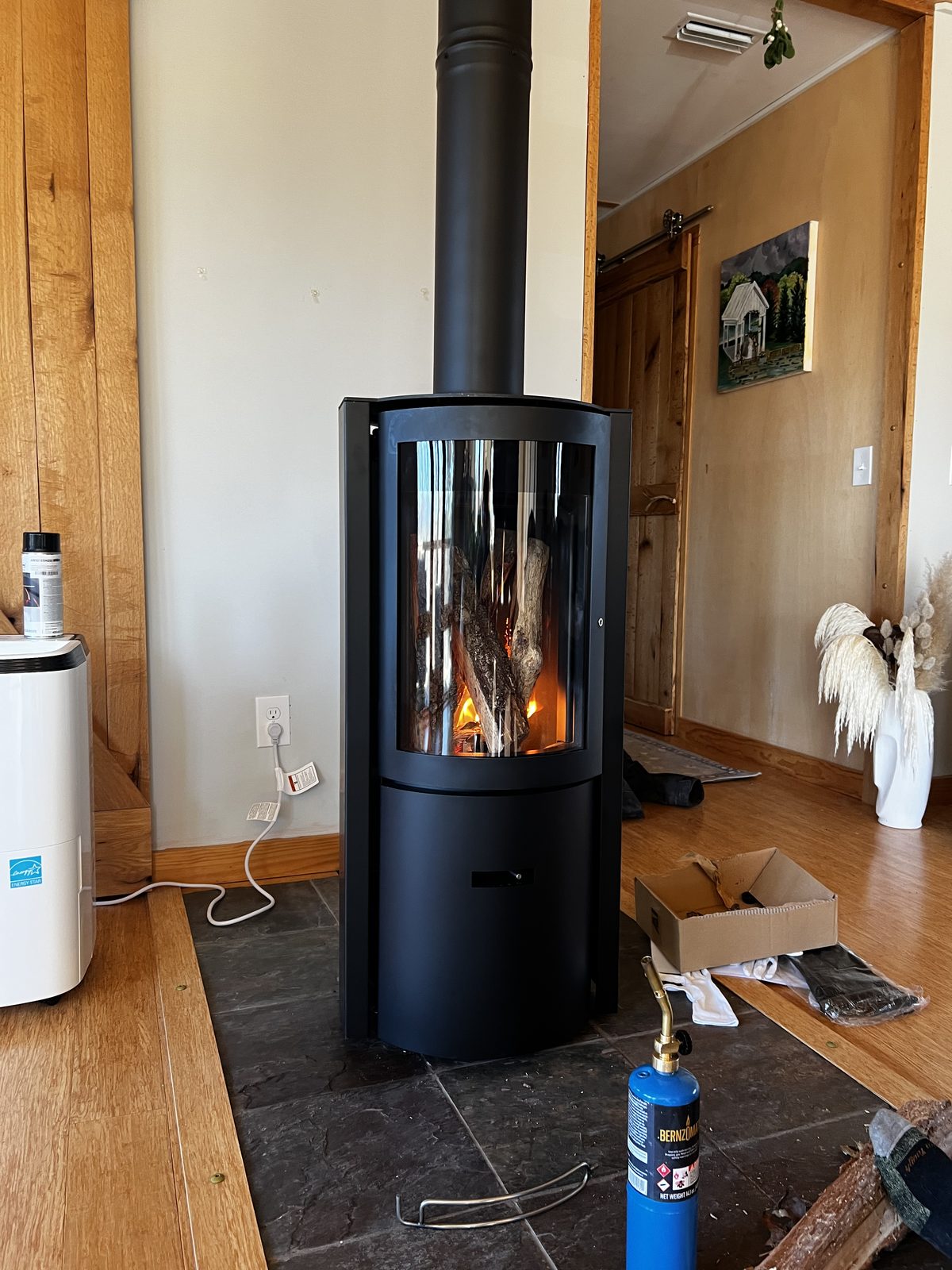 Stûv 30 wood stove installed in a living room