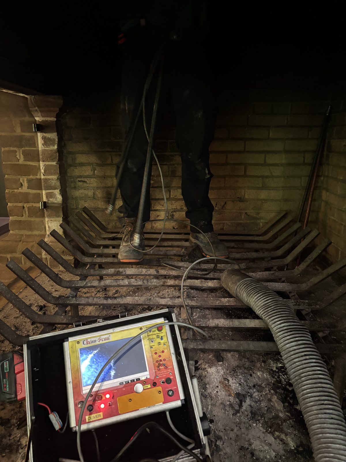 A camera monitor inside a chimney during a Level 2 video scan